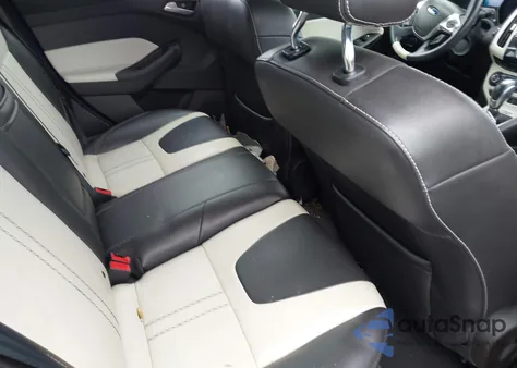 2012 Ford Focus Titanium z USA, uszkodzony, nr VIN 1FAHP3N24CL283473